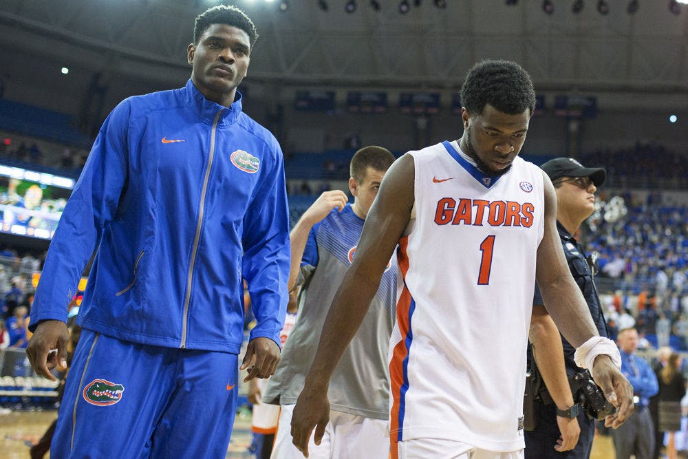 <p>Eli Carter walks off the court following Florida's 69-67 loss to Miami on Nov. 17 in the O'Connell Center.</p>