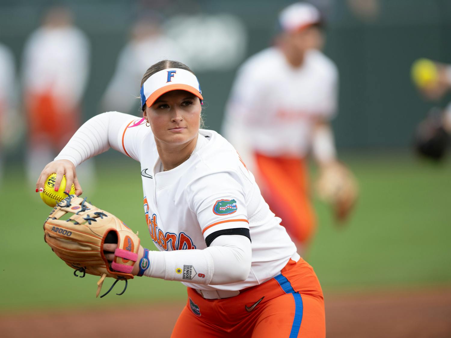 Florida Gators infielder Alyssa Hobermale (9) throws the ball before a softball game against Providence in Gainesville, Fla., on Friday, Feb. 14, 2025.
