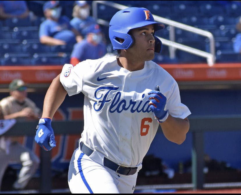 Outfielder Kendrick Calilao runs out of the batters box Mar. 14 against Jacksonville. The sophomore is one of just two Florida players without an error this season