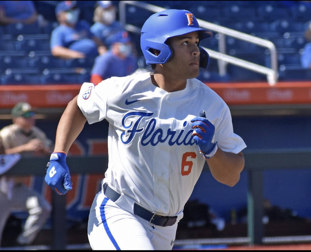 <p>Outfielder Kendrick Calilao runs out of the batters box Mar. 14 against Jacksonville. The sophomore is one of just two Florida players without an error this season</p>