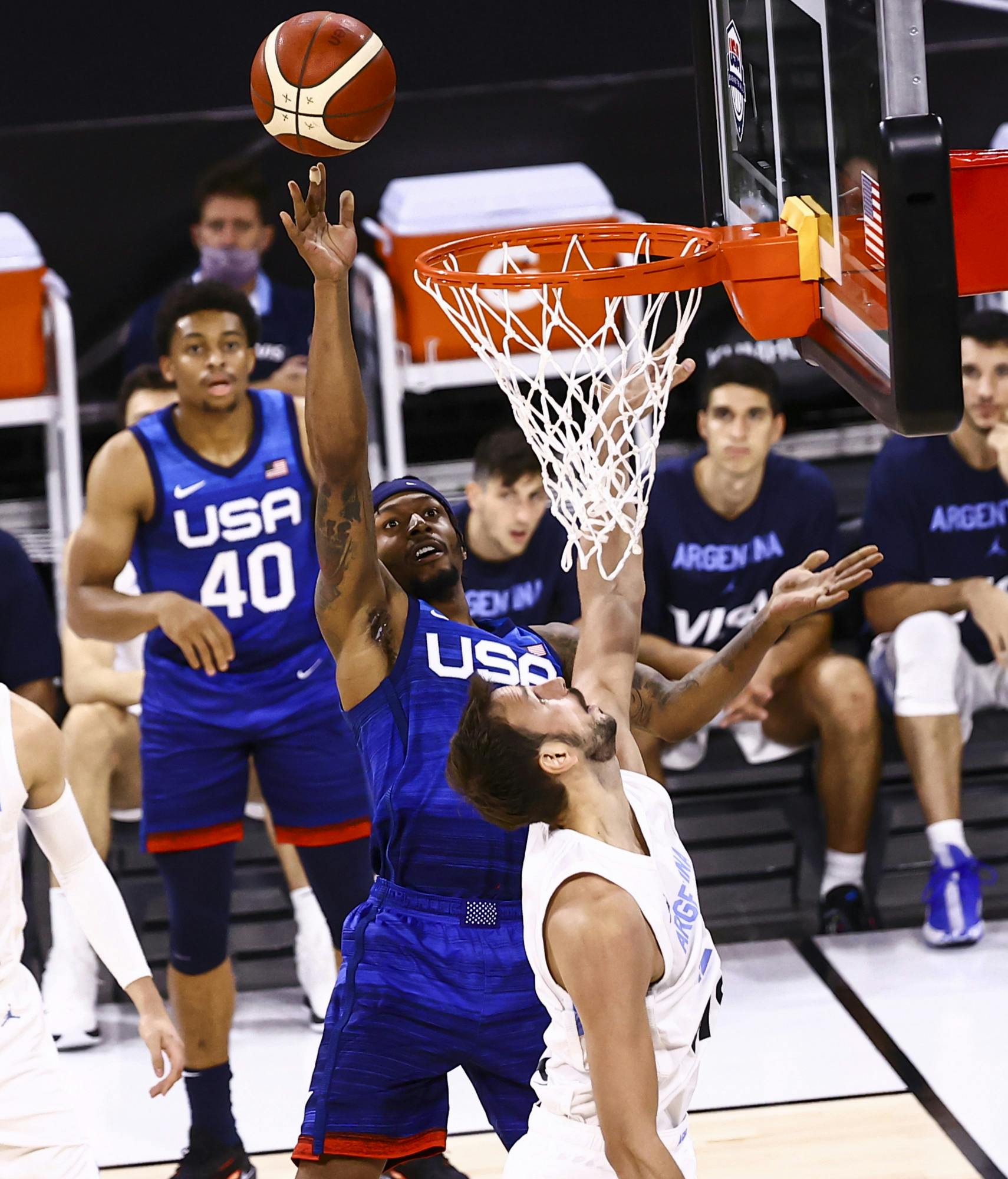 United States' Bradley Beal shoots around Argentina's Marcos Delia during the second half of an exhibition basketball game in Las Vegas on Tuesday, July 13, 2021. (Chase Stevens/Las Vegas Review-Journal via AP)