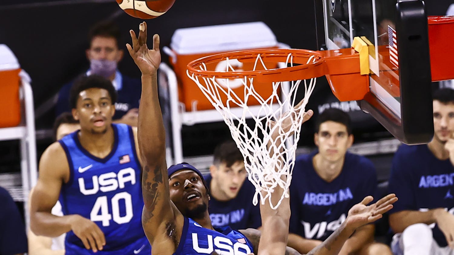 United States' Bradley Beal shoots around Argentina's Marcos Delia during the second half of an exhibition basketball game in Las Vegas on Tuesday, July 13, 2021. (Chase Stevens/Las Vegas Review-Journal via AP)