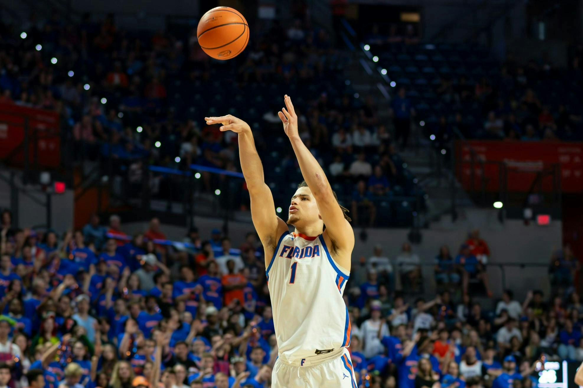 Florida guard Walter Clayton Jr. (1) takes a three point shot during the Gators’ 83-74 win over the Missouri Tigers on Feb. 28, 2024.