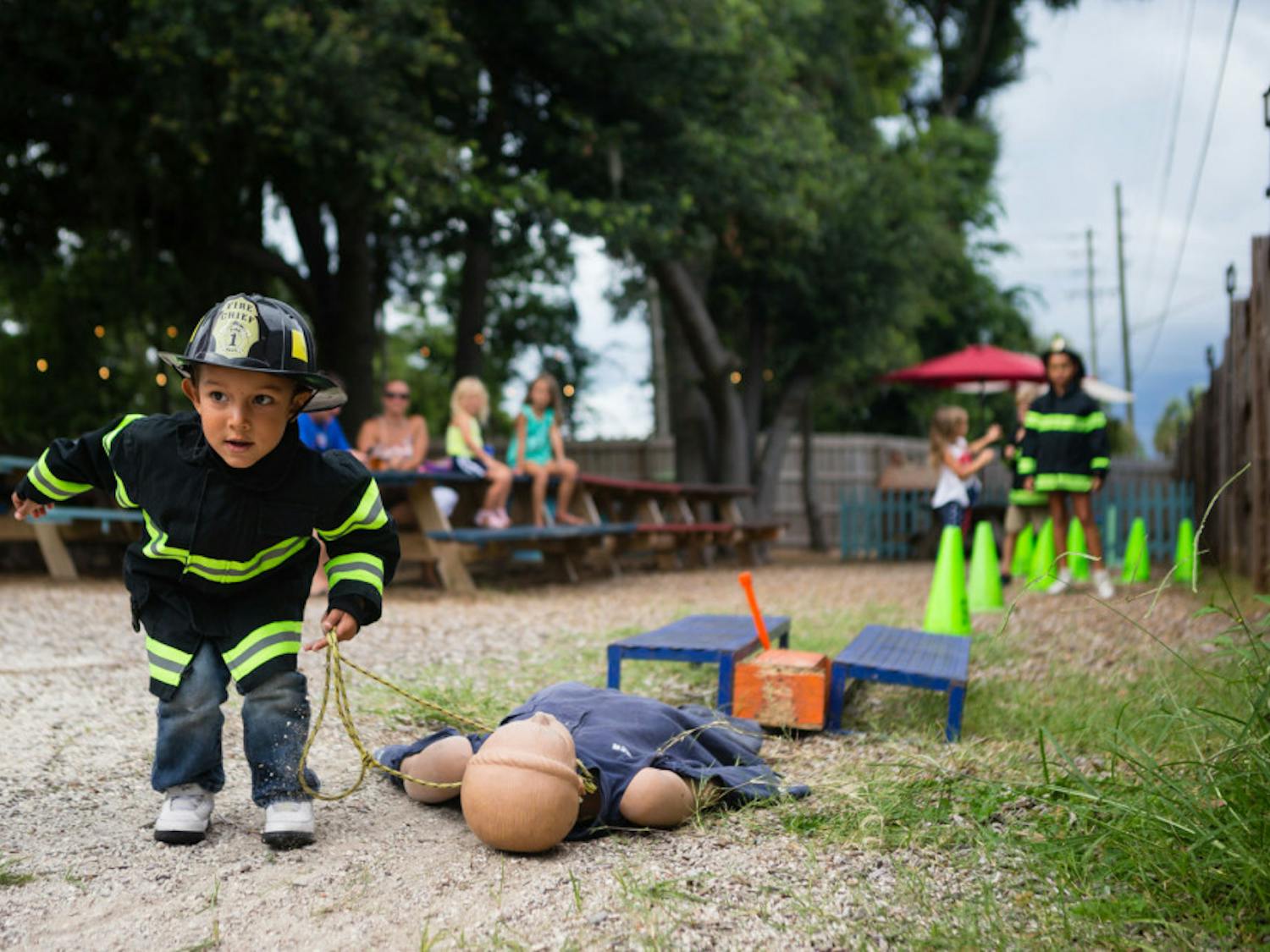 Children participated in a “Kiddie Combat” obstacle challenge during Saturday’s “Sausages for Safety” fundraiser.