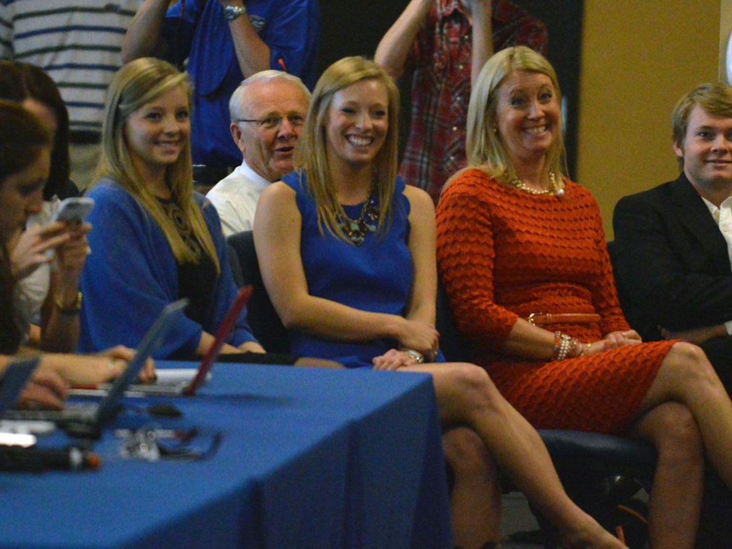 Daughters Elizabeth McElwain (from left) and Johanna McElwain, wife Karen McElwain and son Jerret McElwain listen to their father's introductory press conference on Saturday in Ben Hill Griffin Stadium.