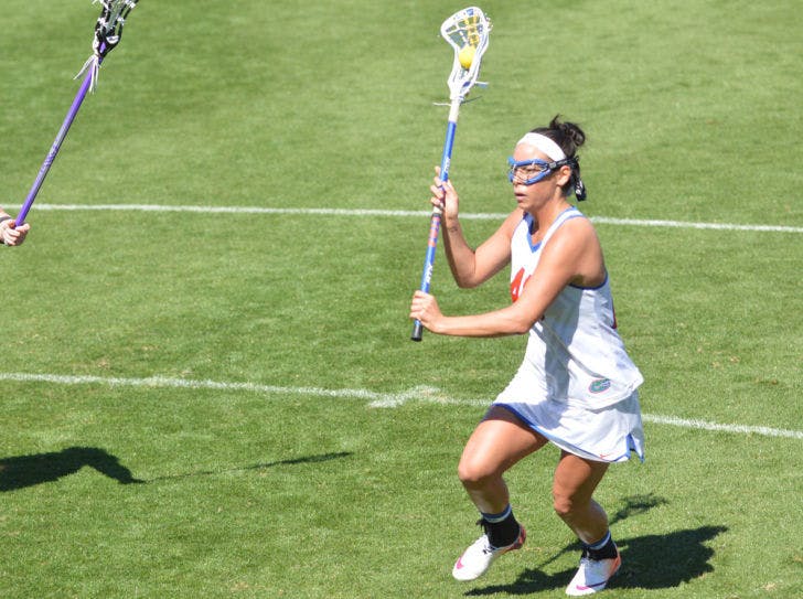 Sam Darcangelo prepares to shoot during Florida’s 18-7 win against High Point on Feb. 15, 2014 at Donald R. Dizney Stadium.
