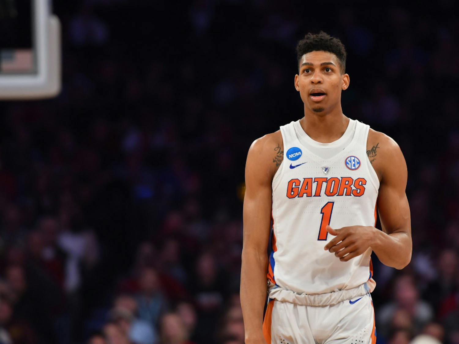 Devin Robinson stands on the court during Florida's 77-70 loss against South Carolina in the Elite Eight of the NCAA Tournament on March 26.