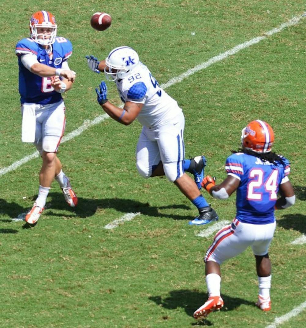 <p>Quarterback Jeff Driskel (6) attempts a screen pass to running back Matt Jones (24) during Florida's 38-0 win against Kentucky at Ben Hill Griffin Stadium on Sept. 22. Offensive coordinator Brent Pease said he wants the sophomore to not try and do too much when Florida hosts LSU on Saturday.</p>