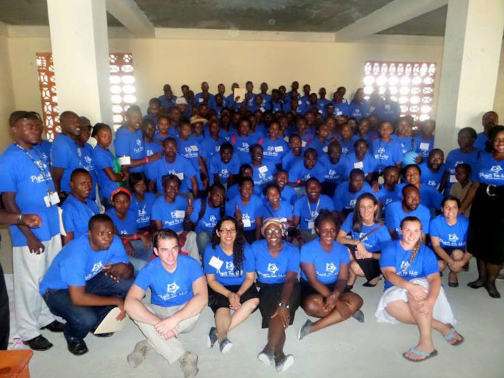 <p class="p1"><span class="s1">Pictured are 135 teachers from the conference held by Projects for Haiti. The event helps them network and improve teaching skills through workshops and training exercises.</span></p>