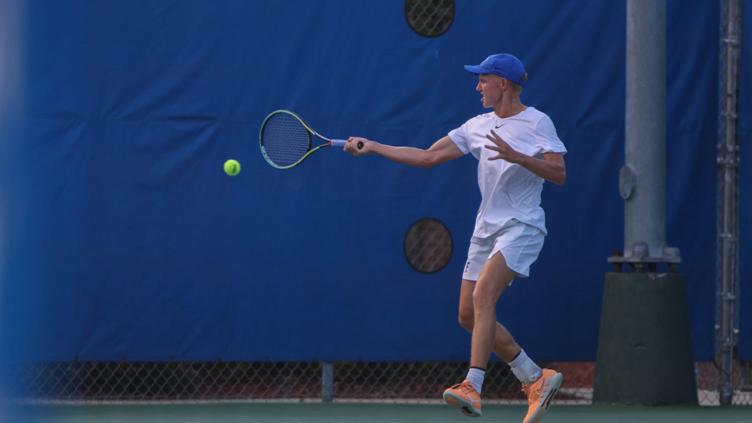 Florida senior Lukas Greif hits the ball with his racket during the Gators' 6-1 win over the Arkansas Razorbacks Friday, March 24, 2023.