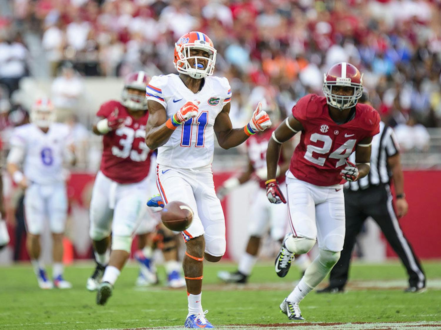 Demarcus Robinson (11) reacts after an incompleted pass during Florida's 21-42 loss to Alabama on Saturday at Bryant-Denny Stadium.
