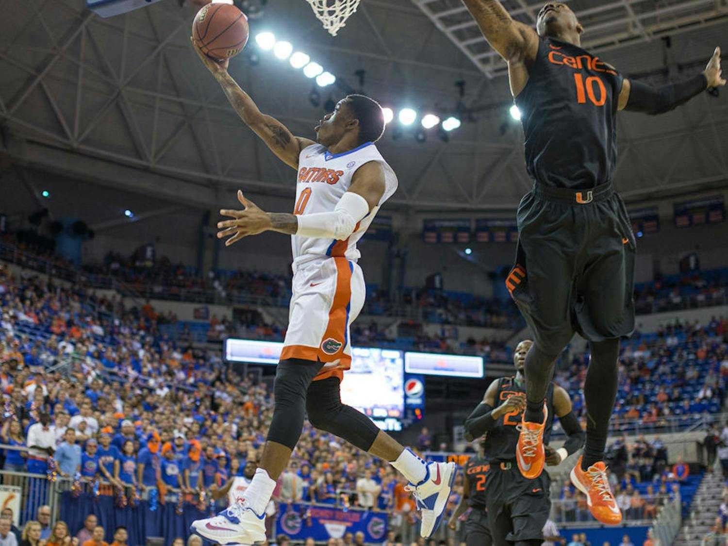 Kasey Hill attempts a layup during Florida's loss to Miami.