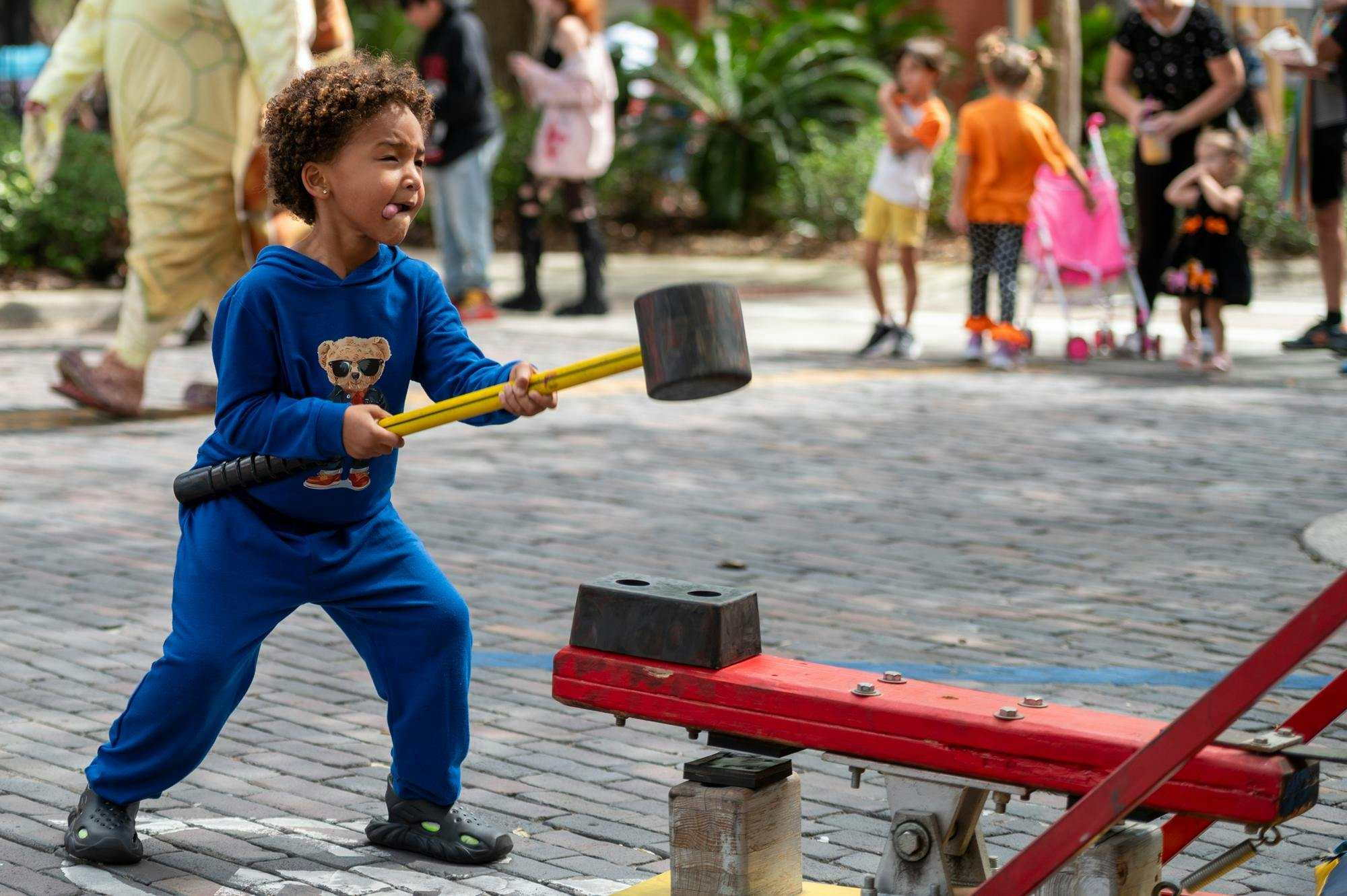 Gainesville's first Great Pumpkin Bash attracted about 200 visitors of all ages on Oct. 11. Families walked around the plaza, pushing strollers and walking dogs. Vendors sold food, drinks and clothes, while tablers offered information about their organizations. The inaugural fall festival also featured face painting, a scavenger hunt and musical chairs with polka renditions of pop songs.