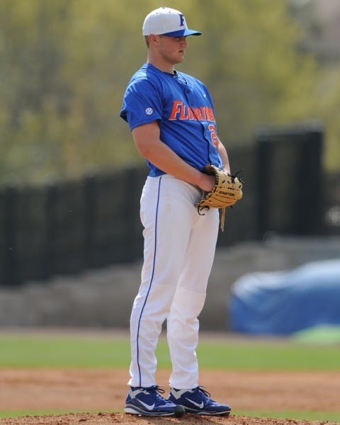 Florida pitcher Karsten Whitson prepares to throw a pitch during a game against USF last season. Whitson has been limited this year.