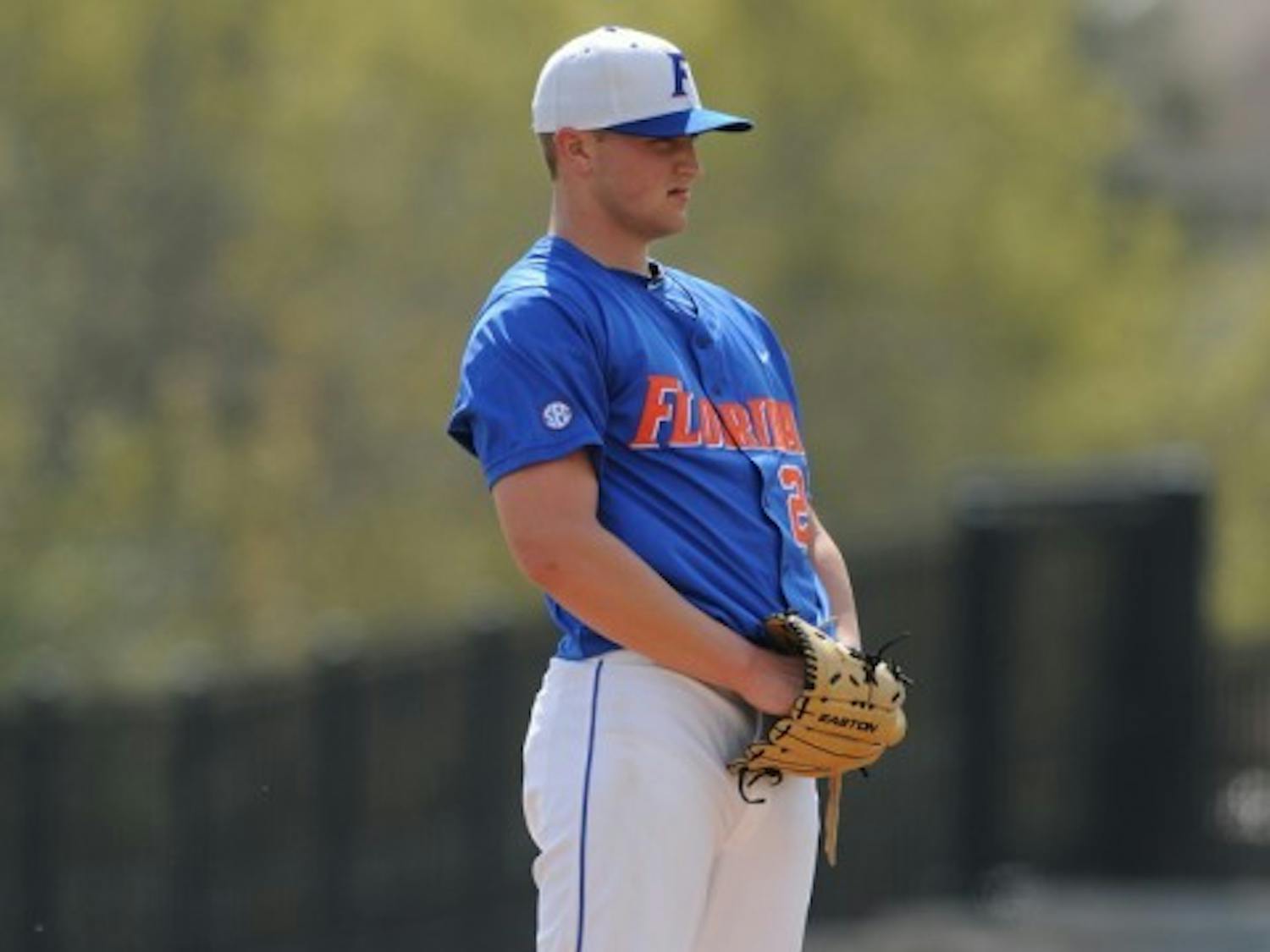 Florida pitcher Karsten Whitson prepares to throw a pitch during a game against USF last season. Whitson has been limited this year.