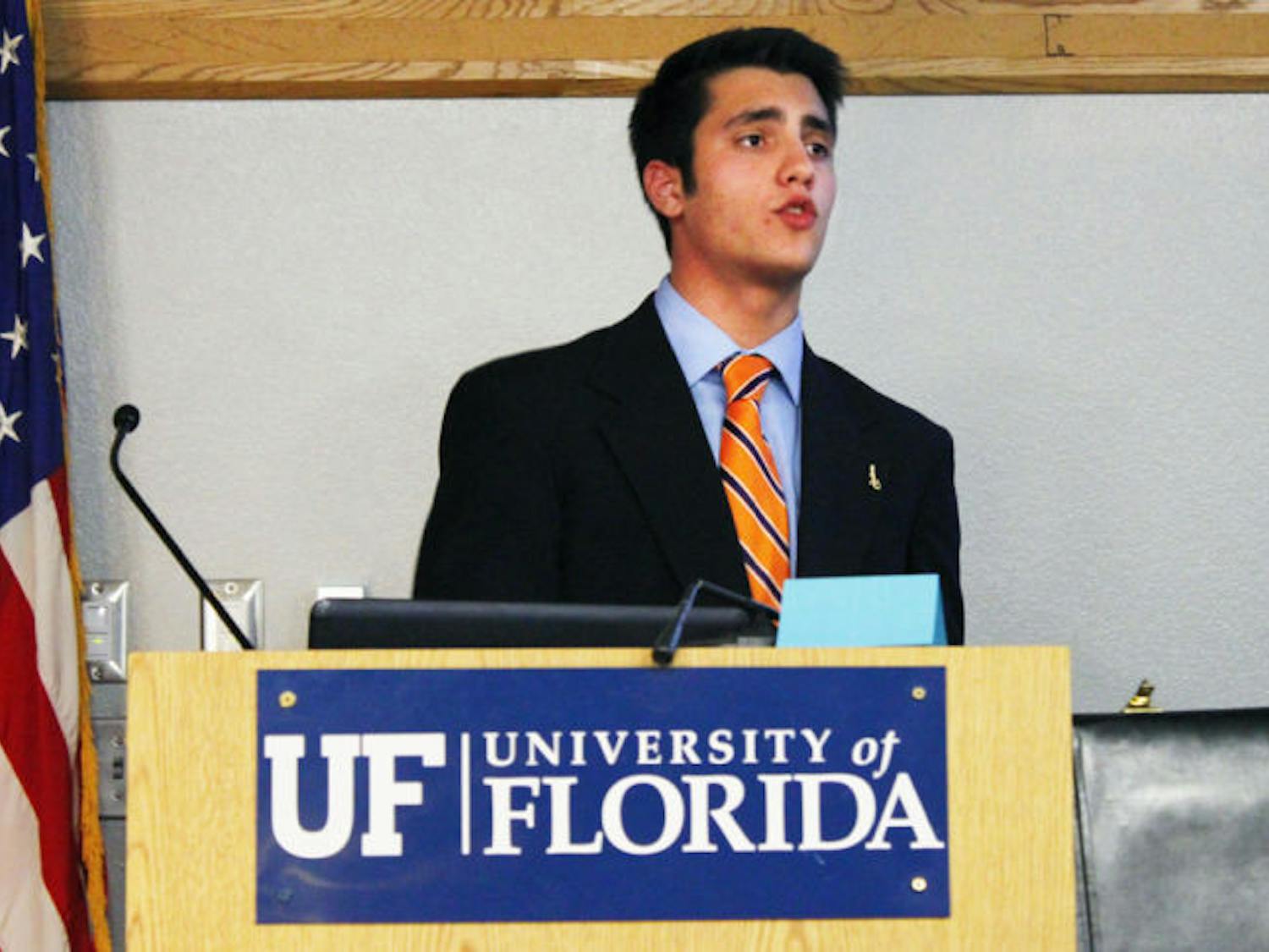 Student Government Budget and Appropriations Committee Chairman Joseph Michaels presents the 2013-2014 academic and student organization budgets to the Student Senate on Tuesday night.