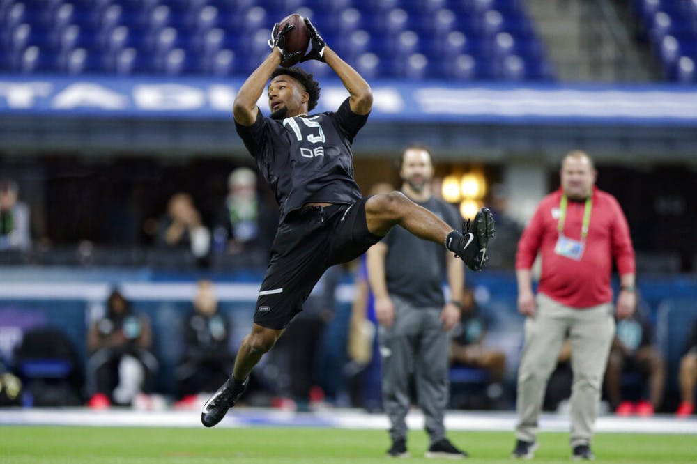 <p>Florida defensive back C J Henderson runs a drill at the NFL football scouting combine in Indianapolis, Sunday, March 1, 2020. (AP Photo/Michael Conroy)</p>