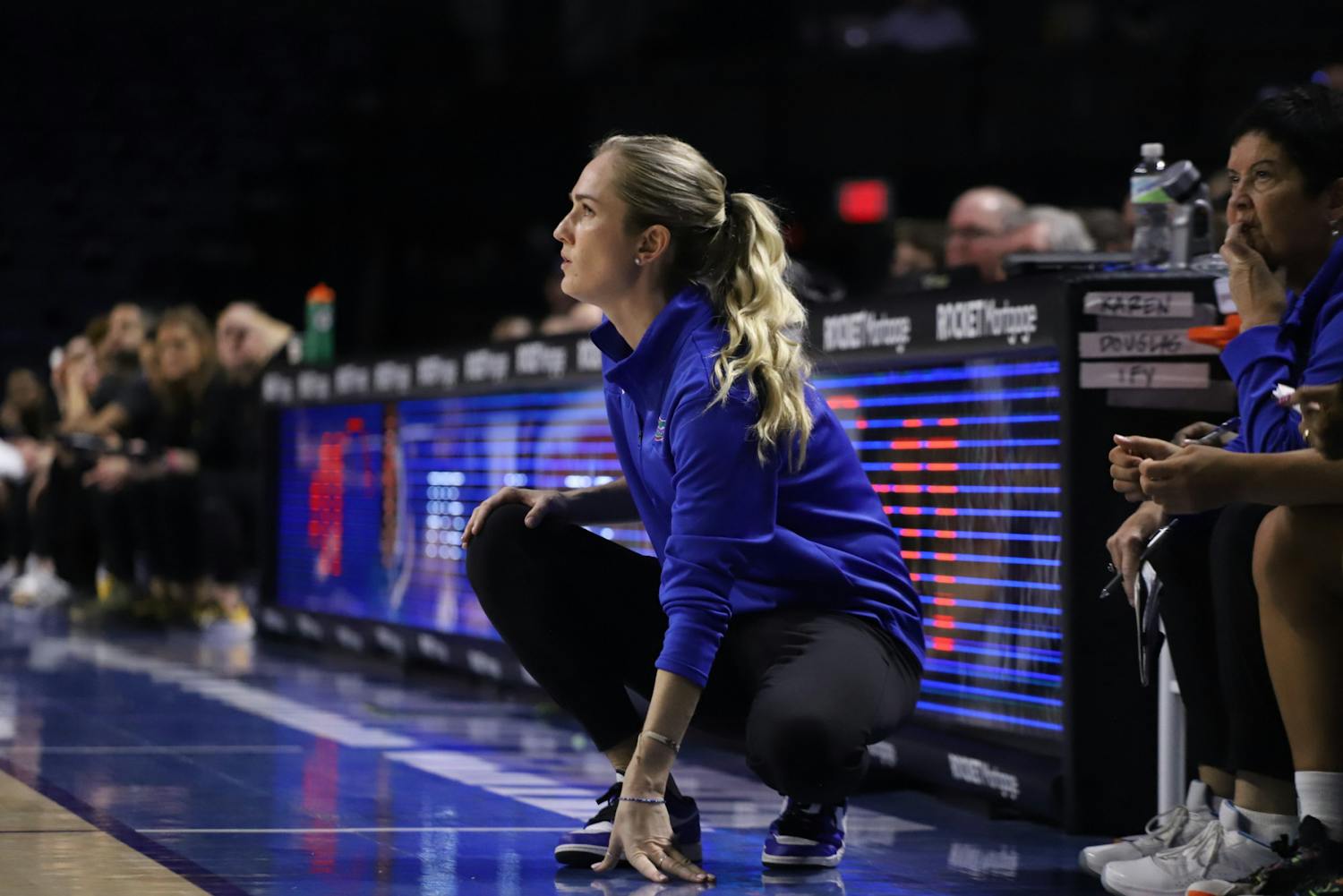 Head women&#x27;s basketball coach Kelly Rae Finley watches her team from the side of the court Feb. 27.