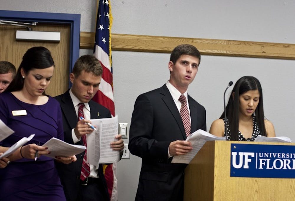 <p>Student Senators Matt Mountjoy and Katie Waldman present revisions to UF's Student Government elections codes. Mountjoy and Waldman co-chaired a committee that formed to examine and modify the rules.</p>