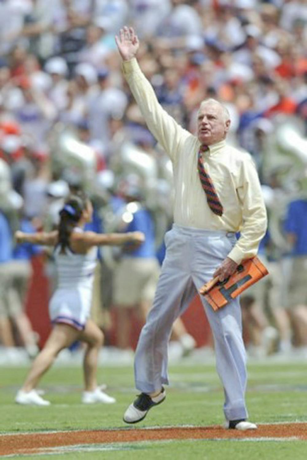 <p>George Edmondson Jr., also known as Mr. Two Bits, leads The Swamp in his signature cheer before the Gators' 2008 home opener against Hawaii Aug. 30.</p>