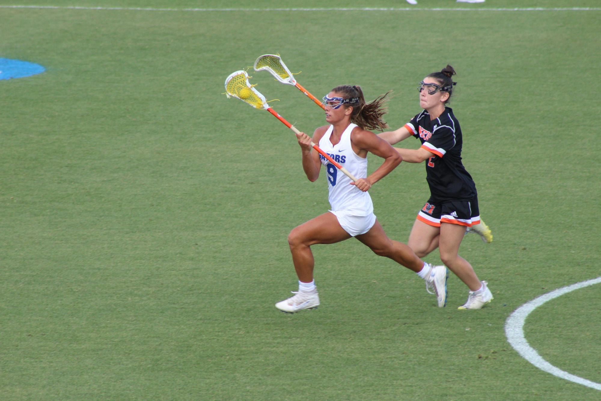 Florida&#x27;s Emily Heller sprints down the field against Mercer May 14, 2021. 