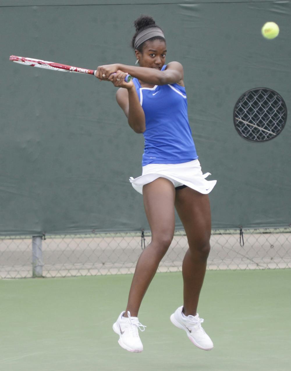 <p>Freshman Brianna Morgan hits a backhand to return a ball during a match against Tennessee on March 17. </p>