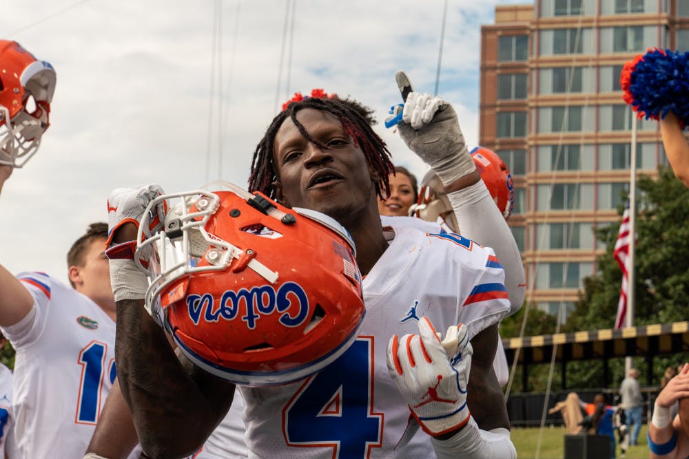 Receiver Kadarius Toney celebrates with teammates and fans after Florida’s win over Vanderbilt. Toney recorded nine yards on four catches and added a 27-yard run from the wildcat position.