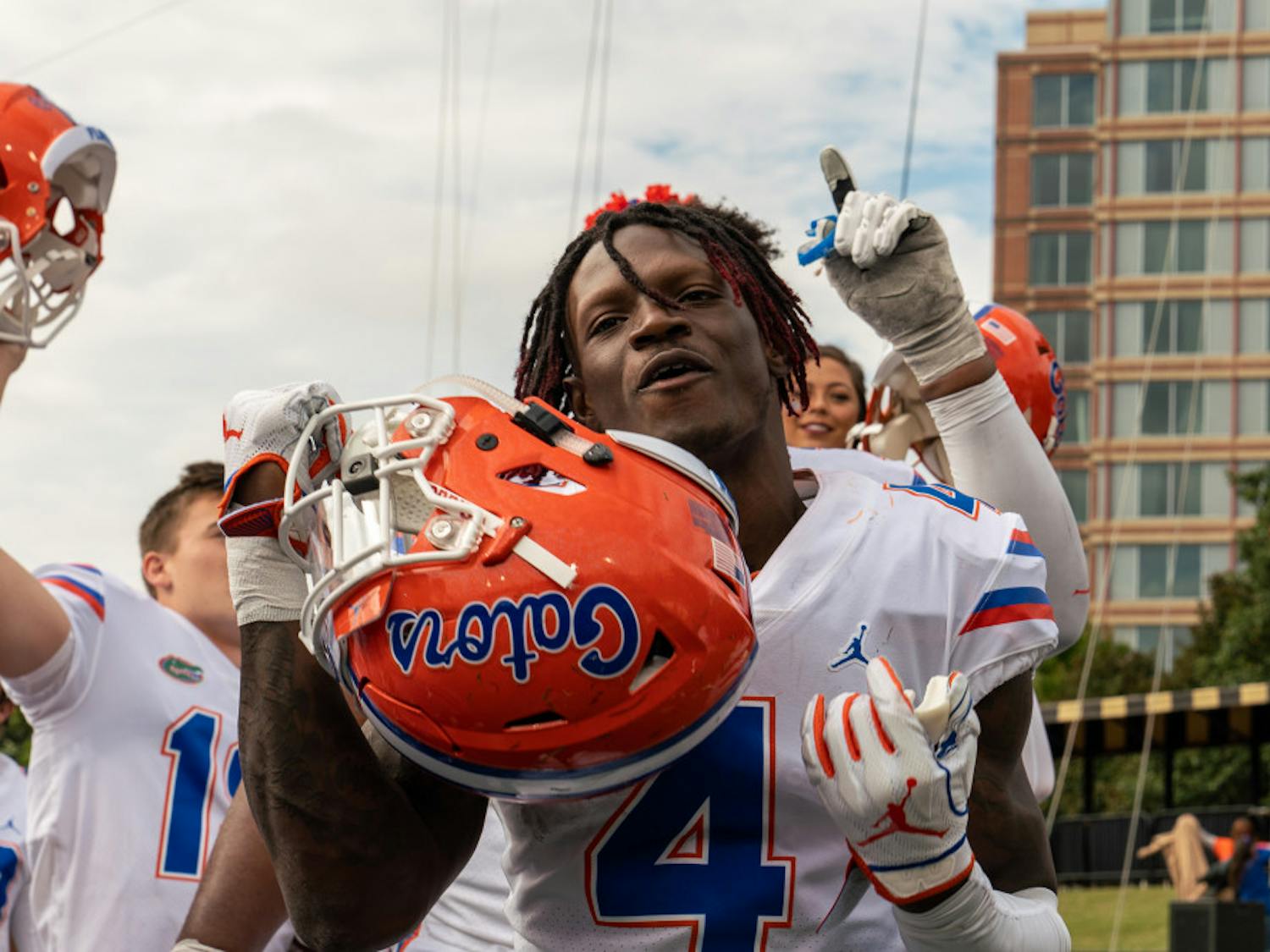 Receiver Kadarius Toney celebrates with teammates and fans after Florida’s win over Vanderbilt. Toney recorded nine yards on four catches and added a 27-yard run from the wildcat position.