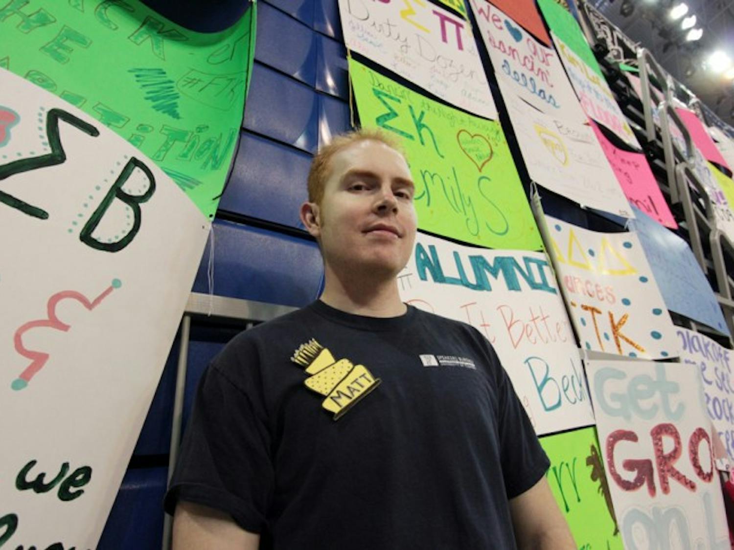 Matt Michel poses for a photo at his ninth Dance Marathon event in the Stephen C. O'Connell Center early Sunday morning.