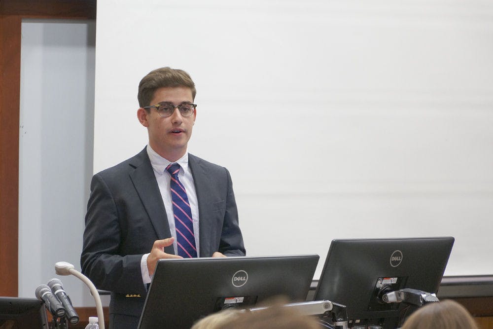 <p>Chris Boyett speaks during the Student Senate meeting Sept. 1, 2015.</p>