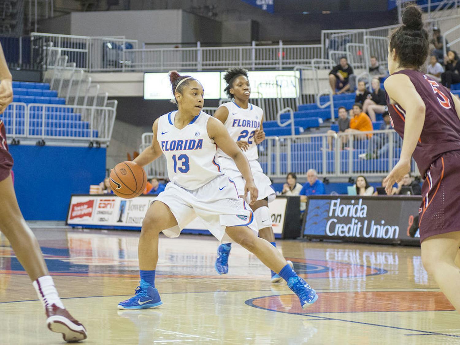 Cassie Peoples drives into the paint during Florida's win against Virginia Tech on Monday in the O'Connell Center.