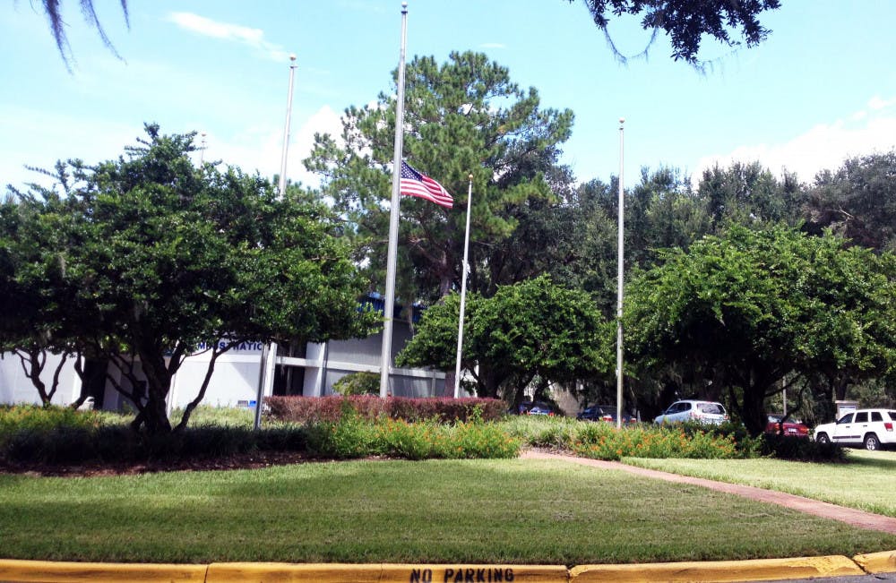 The American flag flies at half mast after Santa Fe College's remembrance ceremony Sept. 11, 2015.
