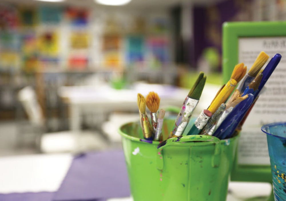 <p>Used paintbrushes sit in a cup at Corks &amp; Colors Studios off Newberry Road on Thursday evening. Rebecca Barborak recently opened a second location in Ocala.</p>