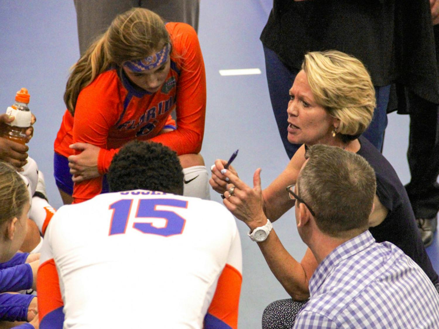 UF coach Mary Wise talks with her players during Florida's 3-1 win over Marshall on Sept. 17, 2016, in the Lemerand Athletic Center.