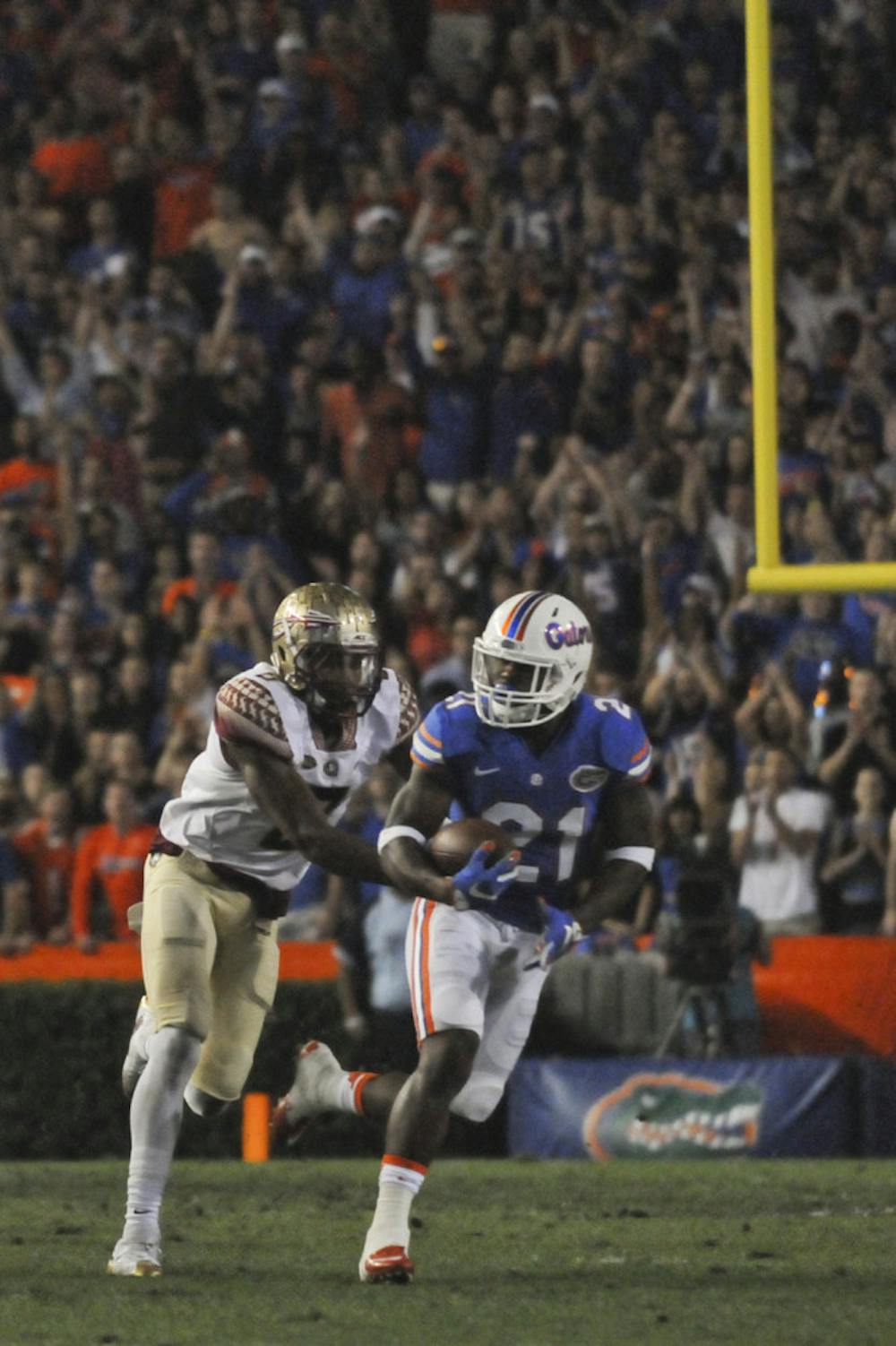 <p>UF's Kelvin Taylor rushes during Florida's 27-2 loss to Florida State on Nov. 28, 2015, at Ben Hill Griffin Stadium.</p>