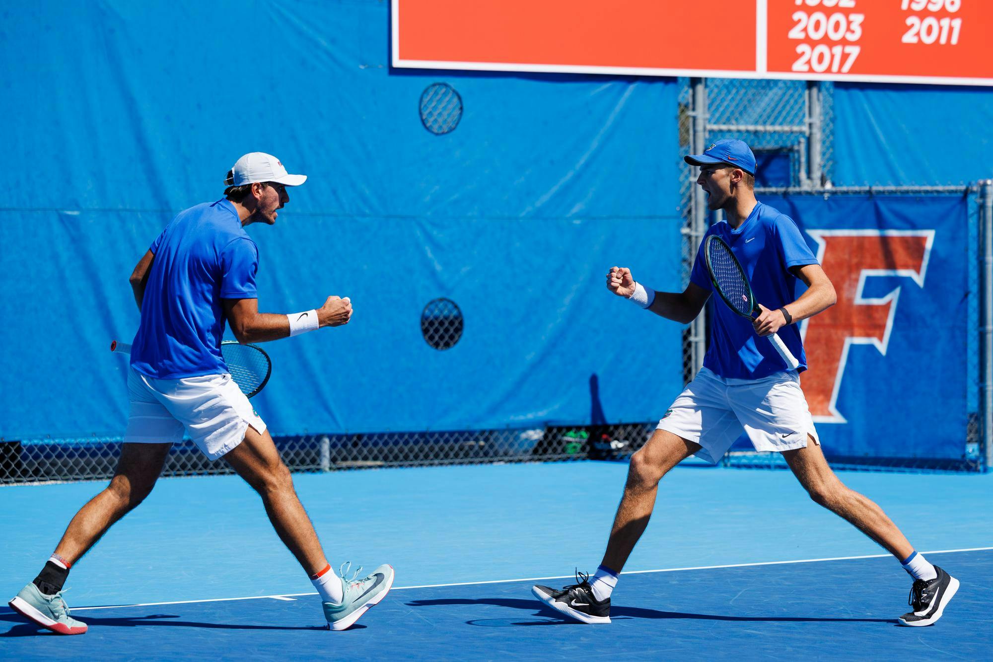 Florida tennis players Henry Jefferson and Lorenzo Claverie celebrate during an NCAA tennis match against South Carolina, Sunday, March. 1, 2026, in Gainesville, Fla.