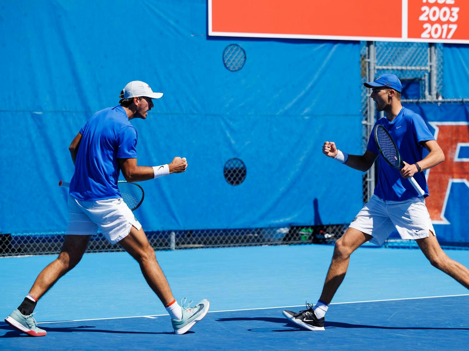 Florida tennis players Henry Jefferson and Lorenzo Claverie celebrate during an NCAA tennis match against South Carolina, Sunday, March. 1, 2026, in Gainesville, Fla.
