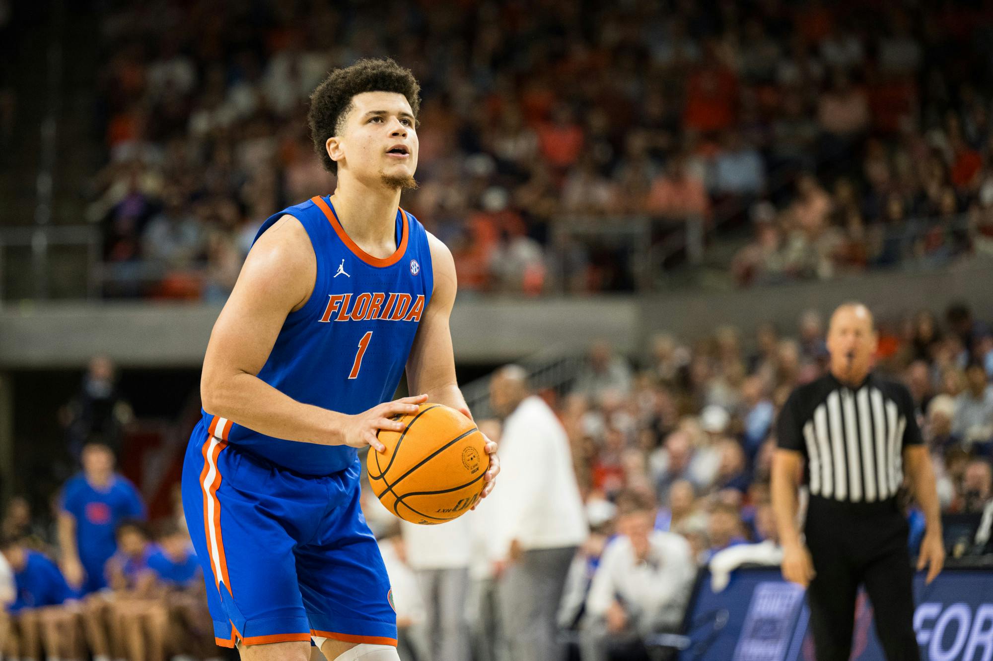 Florida Gators guard Walter Clayton Jr. (1) shoots a free throw in a basketball game against Auburn University on Saturday, Feb. 8, 2025, in Auburn, Ala.