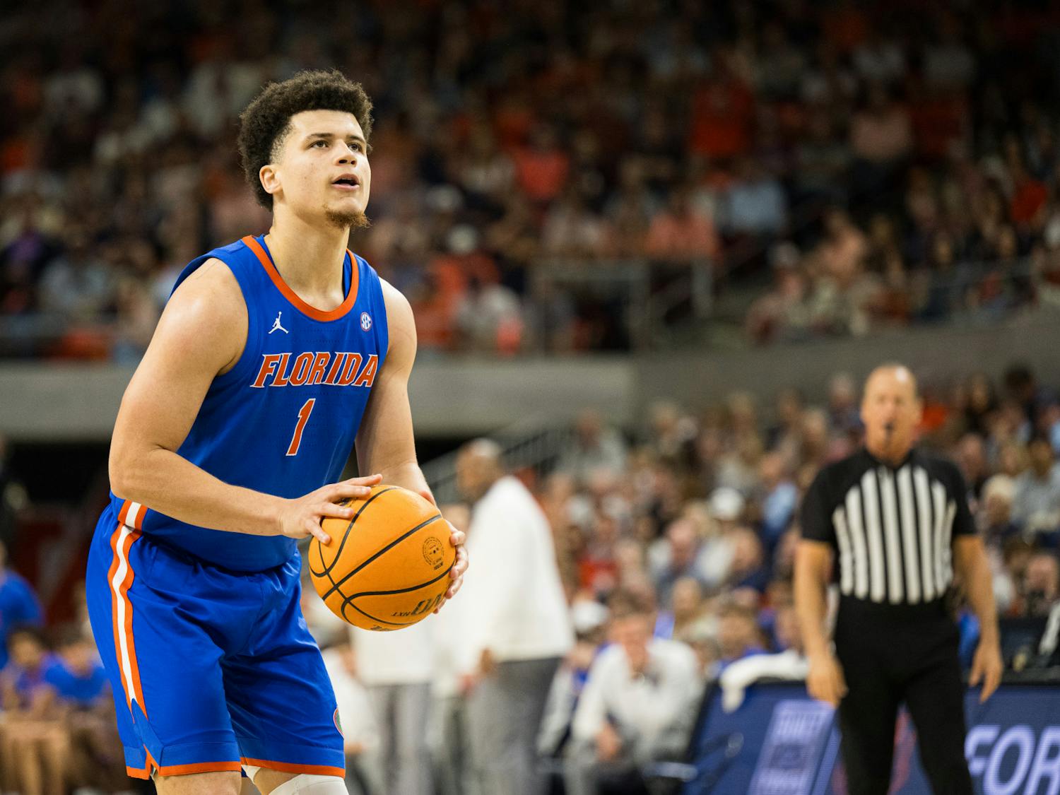Florida Gators guard Walter Clayton Jr. (1) shoots a free throw in a basketball game against Auburn University on Saturday, Feb. 8, 2025, in Auburn, Ala.