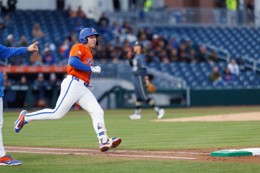 Florida infielder Ethan Surowiec (10) runs to first base during an NCAA baseball game against Florida International University, Wednesday, Feb. 25, 2026, in Gainesville, Fla.