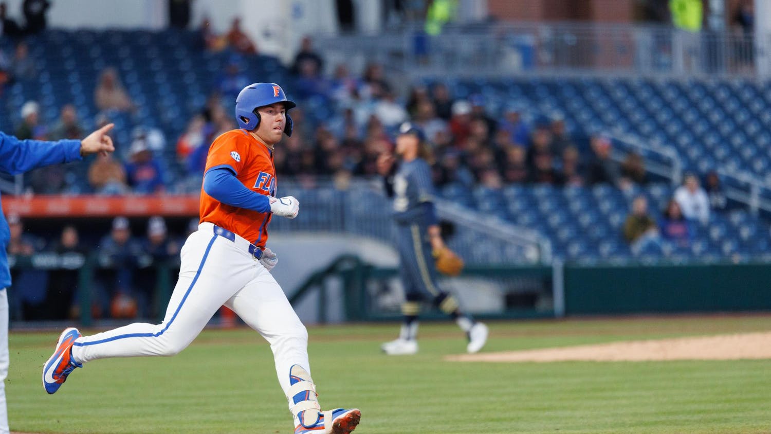 Florida infielder Ethan Surowiec (10) runs to first base during an NCAA baseball game against Florida International University, Wednesday, Feb. 25, 2026, in Gainesville, Fla.