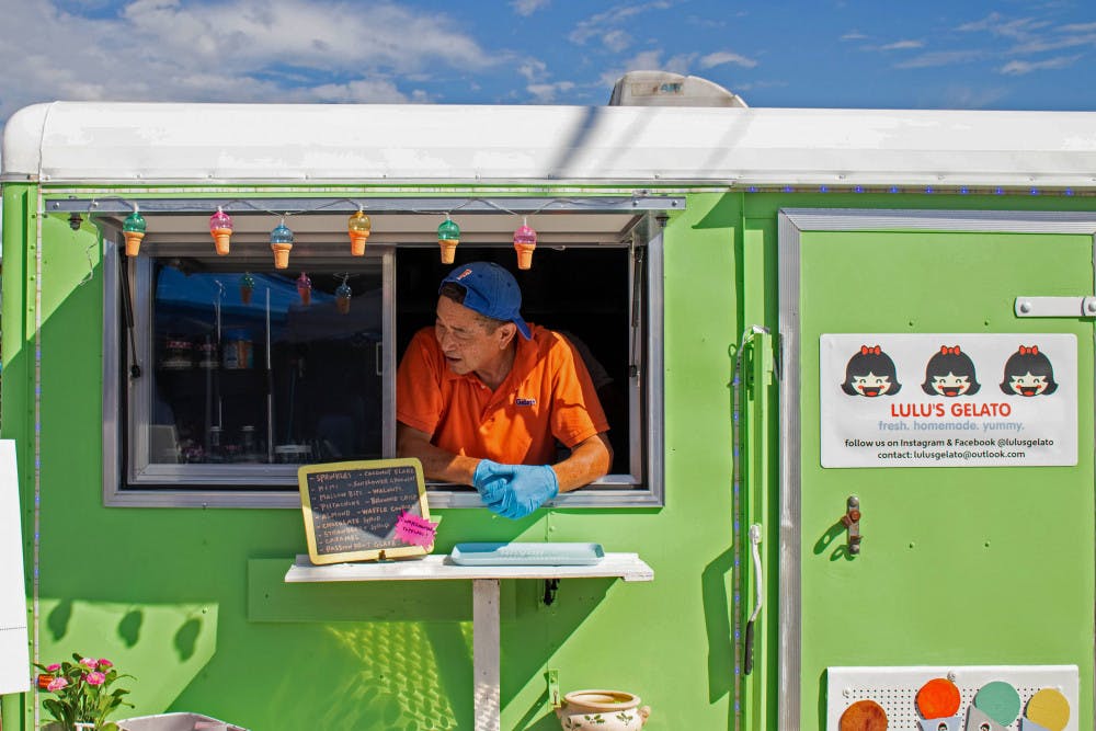 Johnny Ho, the co-owner of Lulu’s Gelato, takes a break in his food truck Sunday afternoon during the First International Food Truck Rally at First Magnitude Brewing Company. Ho and his wife, Tina, have been in the food industry for close to five decades, but now they focus on their gelato truck which they named after their granddaughter Lulu. They make small-batch gelato and sorbetto. Their food truck is normally located at the Jonesville Persimmon and Fruit Tree Nursery. 
