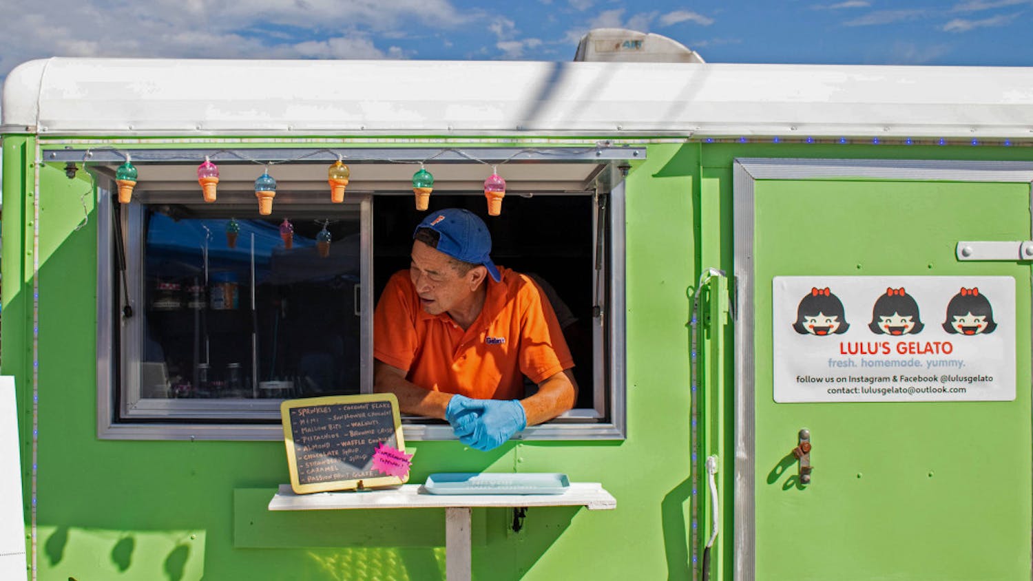 Johnny Ho, the co-owner of Lulu’s Gelato, takes a break in his food truck Sunday afternoon during the First International Food Truck Rally at First Magnitude Brewing Company. Ho and his wife, Tina, have been in the food industry for close to five decades, but now they focus on their gelato truck which they named after their granddaughter Lulu. They make small-batch gelato and sorbetto. Their food truck is normally located at the Jonesville Persimmon and Fruit Tree Nursery. 