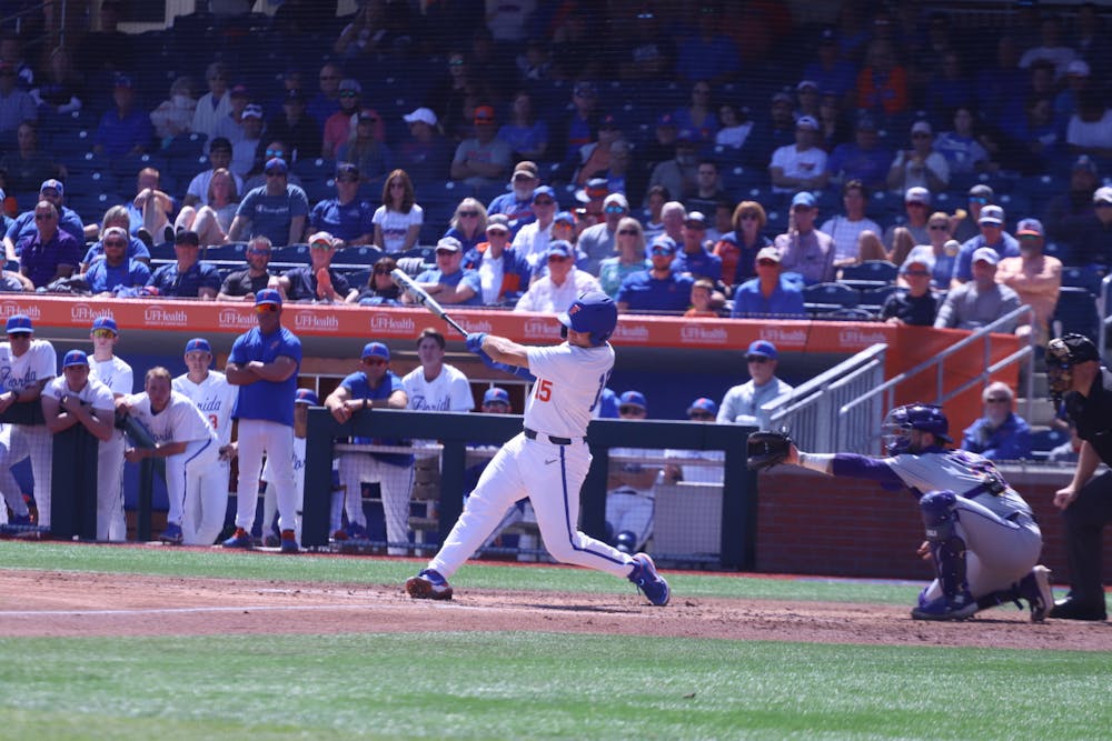 <p>Florida catcher BT Riopelle unloads a hit against LSU March 27. Riopelle unleashed six RBIs Friday night against Mississippi State.</p>