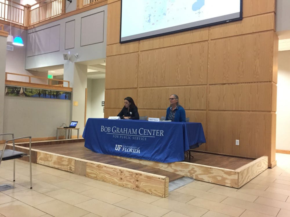 District 2 City Commission candidates Sheryl Eddie and Harvey Ward Jr. answered questions prepared by UF students in Pugh Hall at a forum on Wednesday evening.