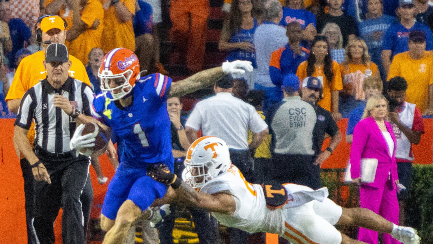Senior wide receiver Ricky Pearsall evades a Tennessee defender in the Gators' 29-16 win against the Volunteers on Saturday, Sept. 16, 2023.