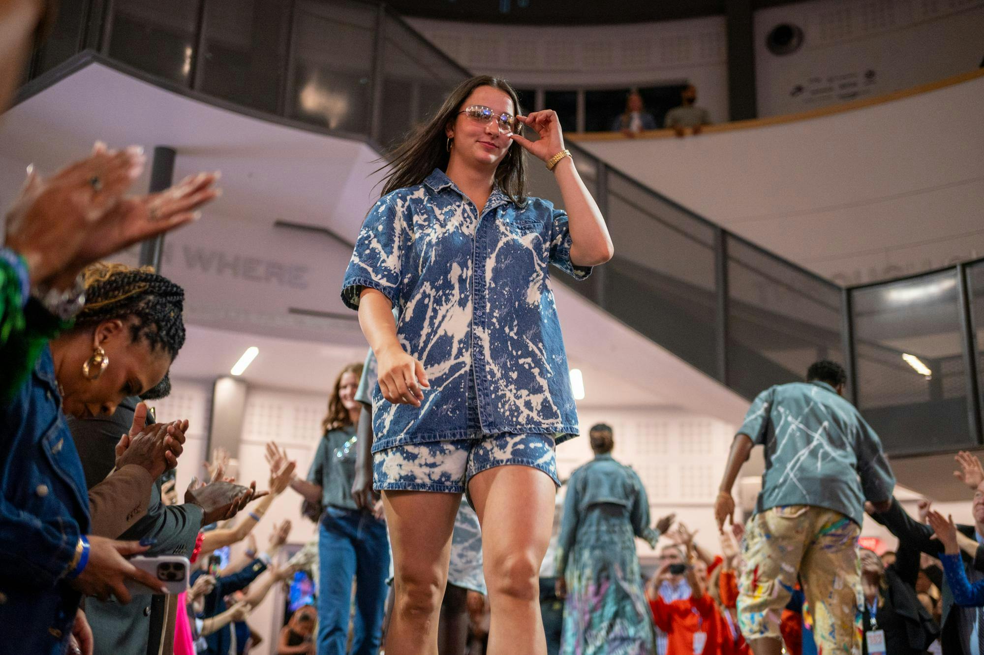 Florida Gators guard Emilija Dakic walking down the runway for at the Eleve 352 fashion show inside the Cade Museum on Thursday, Oct. 16, in Gainesville, Fla.