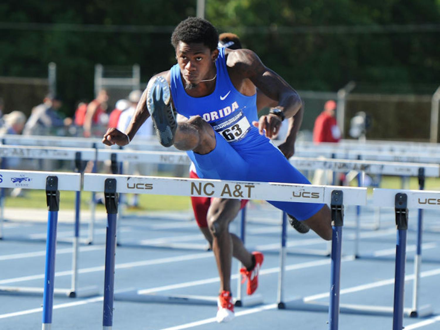 Eddie Lovett leaps over a hurdle during an NCAA East Preliminary Round in Greensboro, N.C., on May 24, 2013. Lovett played with former UF safety Matt Elam in high school.