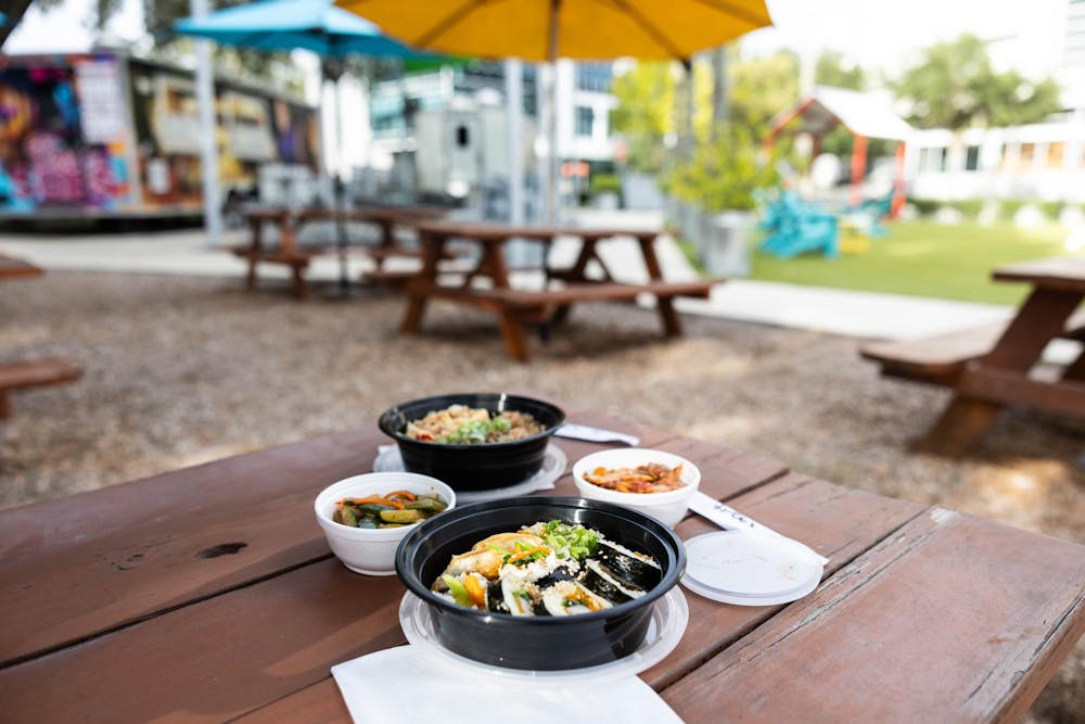 K-INACUP, a family-owned food truck, serves Korean dishes at the Midpoint Park and Eatery on Tuesday, Sept. 9, 2025.