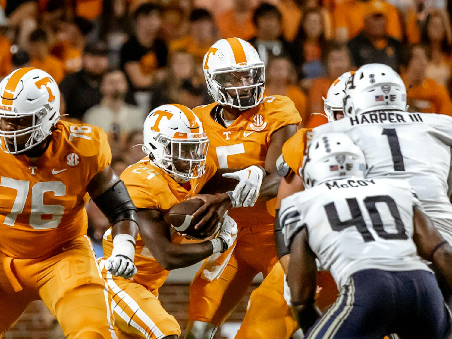 Tennessee quarterback Hendon Hooker hands off the ball at the start of a play against Akron in Neyland Stadium Saturday, Sep. 17, 2022. Photo by: Alexandra Ashmore, The Daily Beacon.

